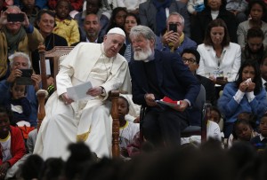 Pope Francis and Vincentian Father Pedro Opeka, founder of the Akamasoa "Community of Good Friends," attend a meeting with members of the community in Antananarivo, Madagascar, Sept. 8, 2019. (CNS photo/Paul Haring) See VATICAN-LETTER-AFRICA Sept. 11, 2019.