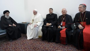 Ayatollah Ali al-Sistani, one of Shiite Islam's most authoritative figures, meets with Pope Francis March 6, 2021, in Najaf, Iraq. The pope was joined by Father George Ayoub, a translator from the Vatican Secretariat of State, Cardinal Louis Sako, the Chaldean patriarch, and Cardinal Miguel Angel Ayuso, president of the Pontifical Council for Interreligious Dialogue. (CNS photo/Vatican Media)