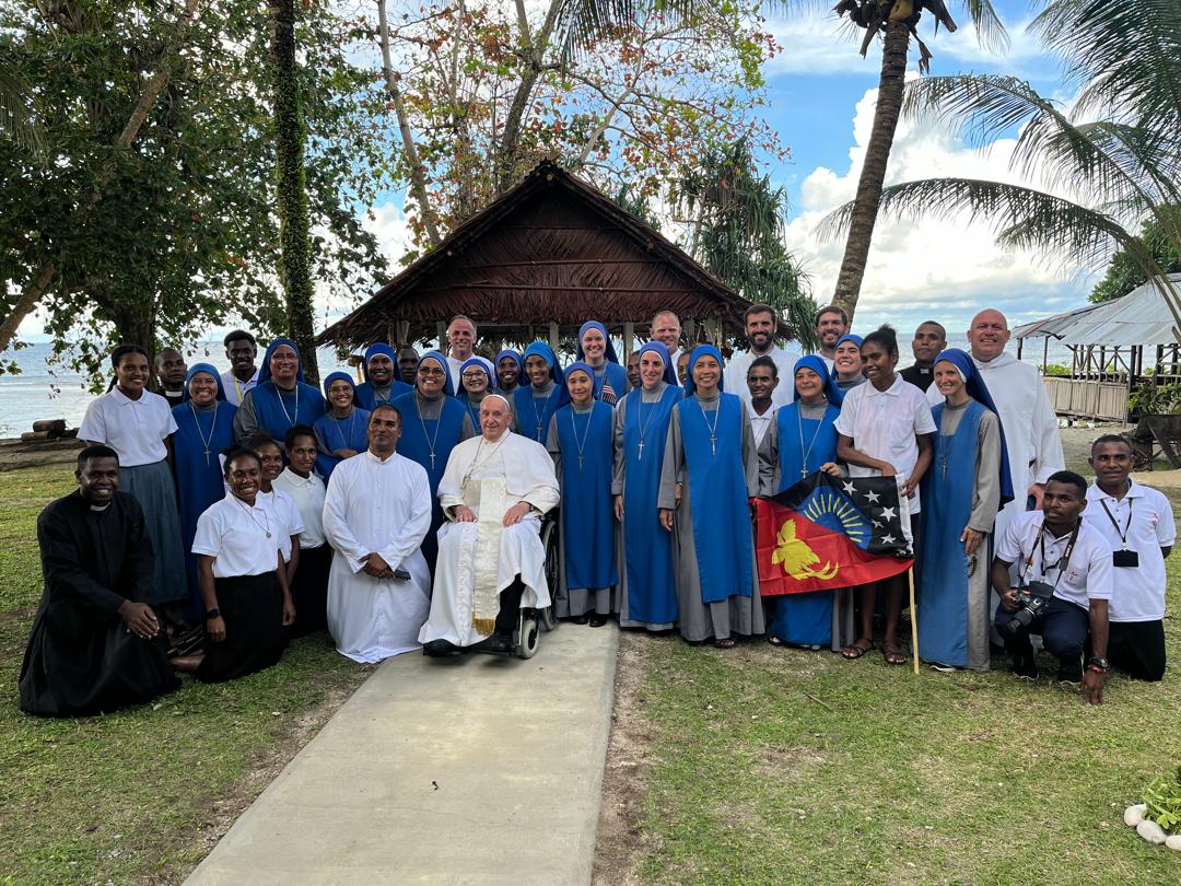 WhatsApp Image 2025-02-22 at 11.58.54 PM (1) Pope Francis, with a group of Argentine missionaries, during his visit to Papua New Guinea in 2024. (Courtesy Father Tomas Ravaioli)